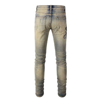 Worn-In Light Blue and Faded Yellow Skinny Fit Jeans with Embroidered Snake