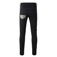 Men's Black Ripped Stretch Jeans with Leopard Print and Ribbed Pieced Design